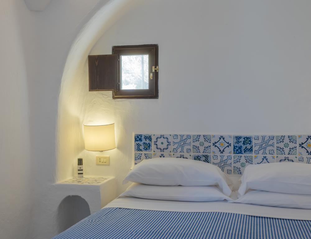 I Dammusi Di Borgo Cala Creta Hotell LMP Rum bild